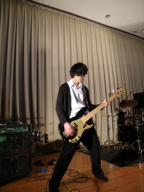 Bassist in my friend's band. They're rockstars!