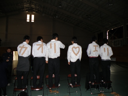 These guys put tape on their shirts to spell out girls names, while the girls were onstage dancing. How cute!